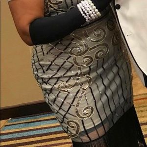 Dress with sequin and fringes